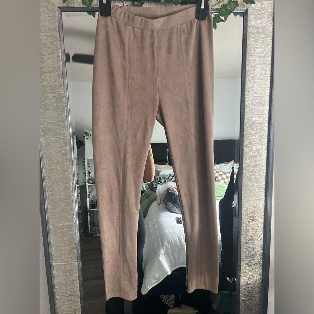 Tan suade work pants.